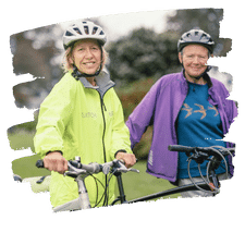 Two women cycling after Hormone Replacement Therapy in Seattle and Olympia